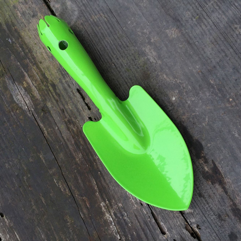 Pá pequena de uma só peça verde